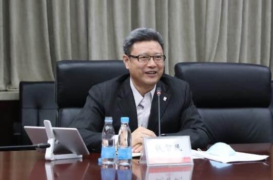 錢智民拜訪中國建材黨委書記、董事長周育先