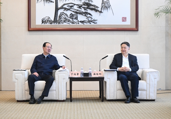 丁焰章與中國華能董事長、黨組書記溫樞剛會談